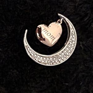 Love you to the moon pendant pup & silver..dangling heaXavierrt. Beautiful!